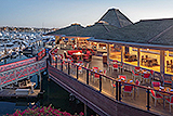 Hyatt Regency Mission Bay Spa and Marina at dusk showing restaurant deck with views of marina